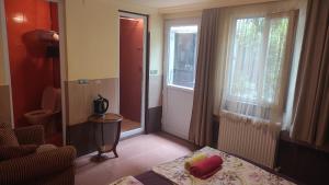 Postel nebo postele na pokoji v ubytování Guesthouse in Batumi 97