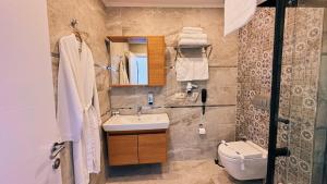 Koupelna v ubytování BİLİRİS HOTEL