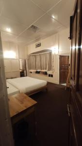 Postel nebo postele na pokoji v ubytování the 1959 house