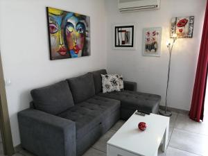 a living room with a couch and a table at BIG apartment 1 bedroom - Playa Paraiso in Playa Paraiso +24 photos