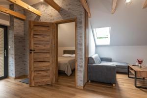 Posteľ alebo postele v izbe v ubytovaní Bianco Apartamenty Laskowa - Zator