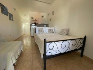 Posteľ alebo postele v izbe v ubytovaní Apartmani Cesarec