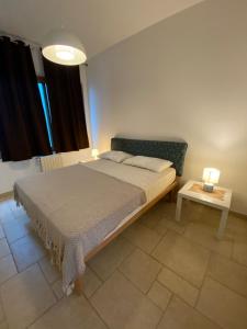Postel nebo postele na pokoji v ubytování Villa Giulio Polignano