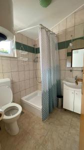 Kúpeľňa v ubytovaní Apartmani Cesarec + 15 fotografií