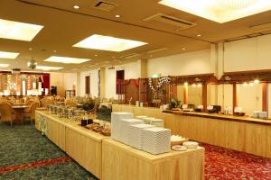 Veitingastaður eða matsölustaður á Hinotani Onsen Misugi Resort