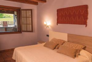 A bed or beds in a room at LAIZARRONDO