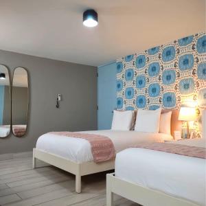 Postel nebo postele na pokoji v ubytování Trópica Beach Hotel