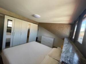 Postel nebo postele na pokoji v ubytování GG Apartment