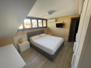 Postel nebo postele na pokoji v ubytování GG Apartment