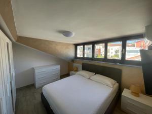 Postel nebo postele na pokoji v ubytování GG Apartment