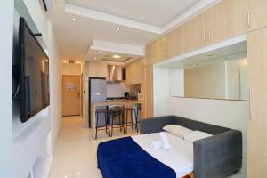 Кухня или мини-кухня в Rio Spot Homes Flat C033A
