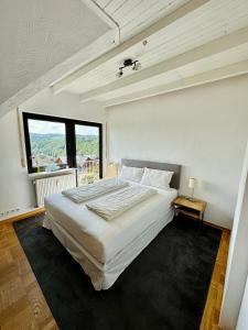 Een bed of bedden in een kamer bij Heidrun's Home