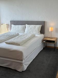 Een bed of bedden in een kamer bij Heidrun's Home