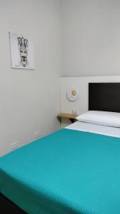 A bed or beds in a room at Donna Felì