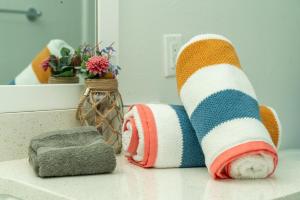 a pair of socks on a counter in a bathroom at Austin - Down by the Sea - 1 br Apt near SoCo in Austin