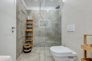 Koupelna v ubytování LORI APARTMENT + 21 fotografií