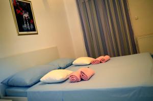 Postel nebo postele na pokoji v ubytování Permarinus Apartments