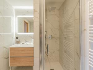 a bathroom with a shower and a sink at Appartement Courchevel 1650, 3 pièces, 6 personnes - FR-1-563-127 in Courchevel