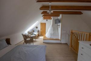 Posteľ alebo postele v izbe v ubytovaní Chalupa Nový Vojířov čp. 27