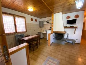 Кухня или кухненски бокс в Appartamento - Casa “Pepi”