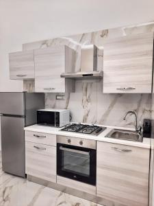 Kuchyňa alebo kuchynka v ubytovaní Re Ferdinando Apartment