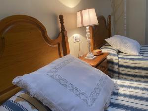 A bed or beds in a room at Casa Veva - Siles