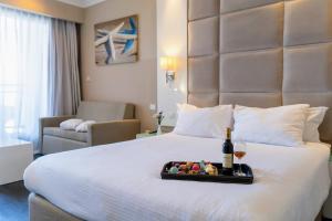 Tamara Ashkelon Hotel客房内的一张或多张床位