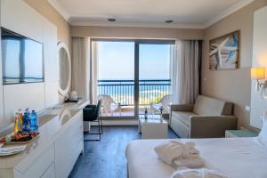 Tamara Ashkelon Hotel客房内的一张或多张床位