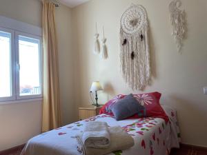 A bed or beds in a room at Casa Veva - Siles