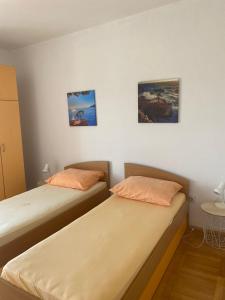 Postel nebo postele na pokoji v ubytování Bura