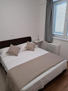 Postel nebo postele na pokoji v ubytování Apartment Rio