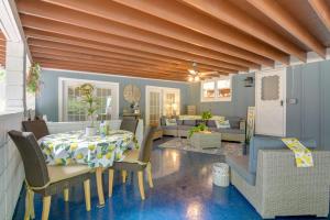 a dining room with a table and chairs at Bright Springfield Home Walk to Nature Center! in Springfield