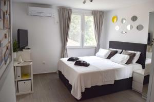 Postel nebo postele na pokoji v ubytování Studio Apartments Anija