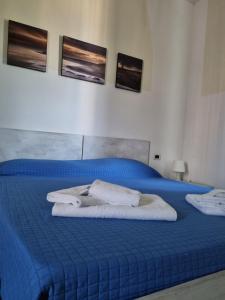 Postel nebo postele na pokoji v ubytování My Room Roma