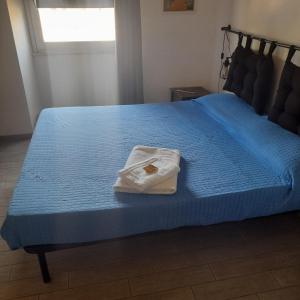 Postel nebo postele na pokoji v ubytování My Room Roma