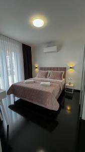 Posteľ alebo postele v izbe v ubytovaní Sunshine House Makarska with Free Beach Parking