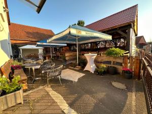 Restoran ili drugo mesto za obedovanje u objektu 1852 Landgasthof- Ferienwohnung