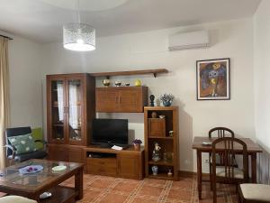 A television and/or entertainment centre at Casa Veva - Siles