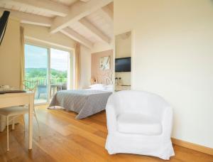 Postel nebo postele na pokoji v ubytování Hotel Giardino Suites&Spa