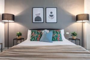 En eller flere senge i et værelse på Marble - a pochi passi dal centro e dalla stazione