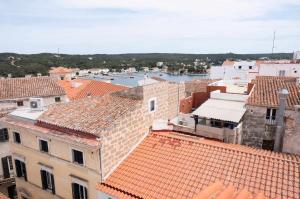 an aerial view of a city with roofs at Casa Turqueta in Mahón