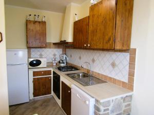 Kuchyň nebo kuchyňský kout v ubytování Casina di Desiree e Aurora