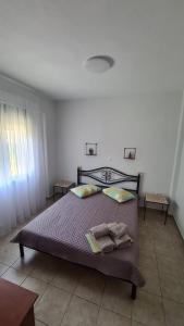 Кровать или кровати в номере Elena Apartments