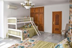 Postel nebo postele na pokoji v ubytování Villa Tela & Vino