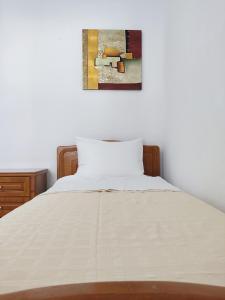 Postel nebo postele na pokoji v ubytování BlueSky House