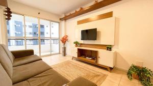 TV a/nebo společenská místnost v ubytování Vista mar em Caiobá com piscina conforto e localização