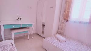 A bed or beds in a room at La casita