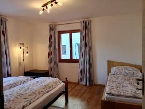 A bed or beds in a room at Apartment Schwarzindien