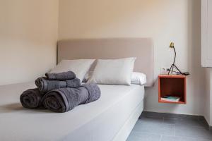 Postel nebo postele na pokoji v ubytování Valentin Suites