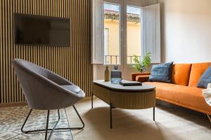 TV a/nebo společenská místnost v ubytování Valentin Suites